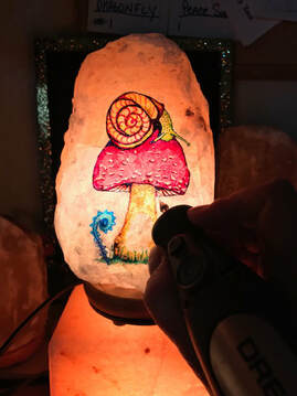 Elizabeth Tapia at work on a salt lamp sculpture